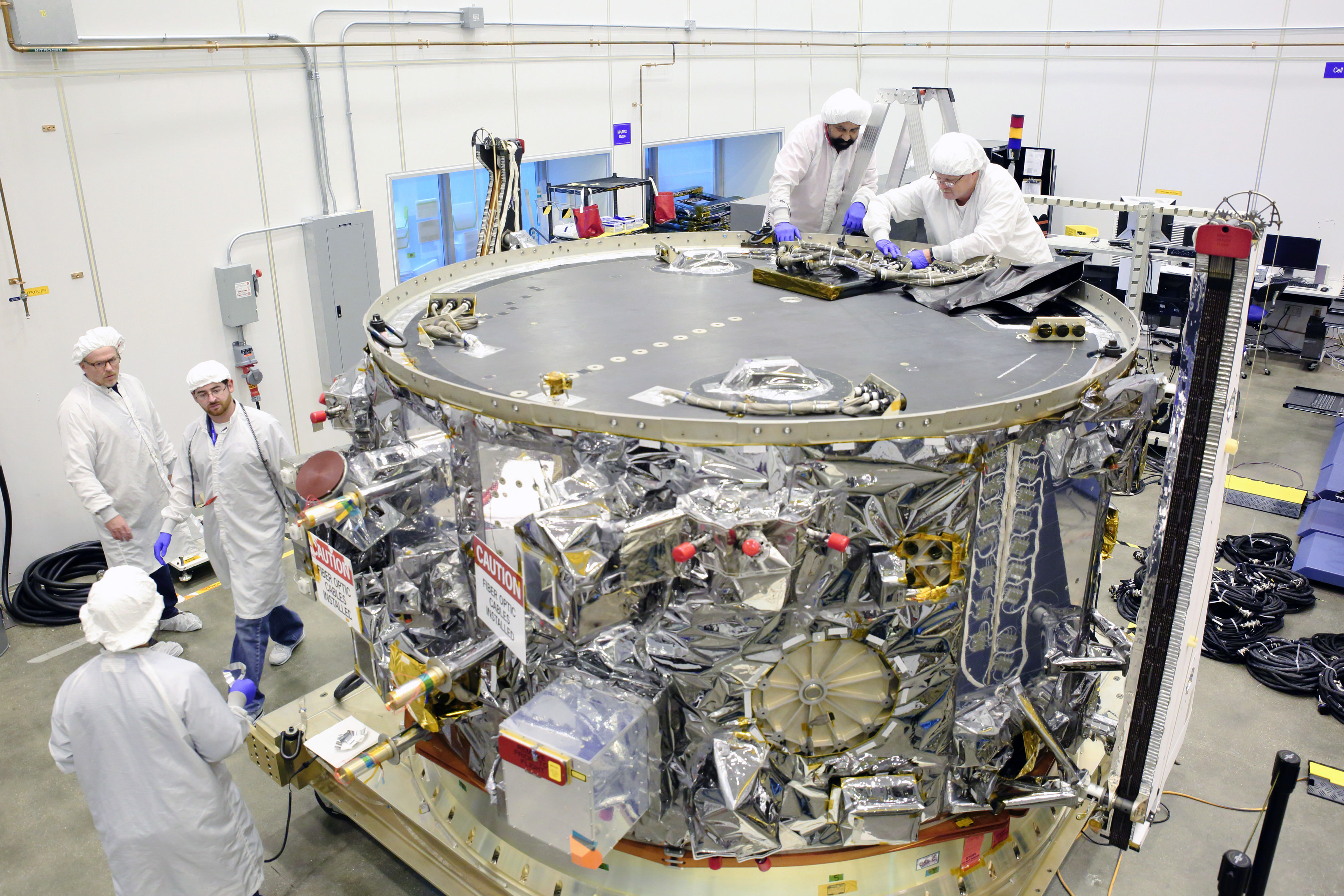 Orbital ATK OA-4 Cygnus service module assembled in the cleanroom in Dulles, Virginia has arrived at NASA’s Kennedy Space Center for integration with the pressurized module.   The OA-4 Cgynus spacecraft is slated to launch on resupply mission to the ISS on ULA Atlas V rocket on Dec. 3, 2015 from Cape Canaveral, Florida.    Credit: Orbital ATK 