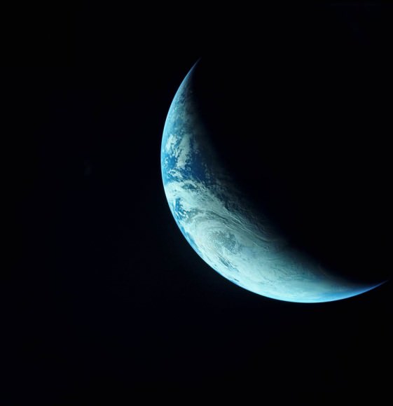 The Earth as photographed from the Apollo 4 mission, the first, unmanned test flight of the Saturn V, which reached an apogee of 18,092 kilometers. November 9, 1967. Credit: NASA. 