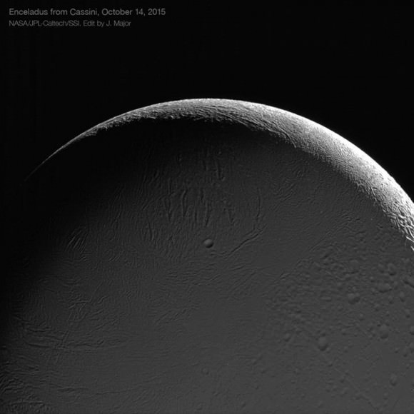 A beautiful view of the night side of a crescent Enceladus, lovingly lit by Saturnshine. This was captured by the Cassini spacecraft during a close pass on Oct. 14, 2015. The 6.5-mile-wide Bahman cater is visible near the center. Credit: NASA/JPL-Caltech/Space Science Institute, image editing by Jason Major. 