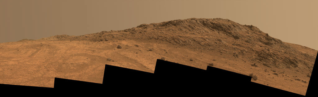 'Hinners Point' Above Floor of 'Marathon Valley' on Mars. This Martian scene shows contrasting textures and colors of "Hinners Point," at the northern edge of "Marathon Valley," and swirling reddish zones on the valley floor to the left. Credit: NASA/JPL-Caltech/Cornell Univ./Arizona State Univ.