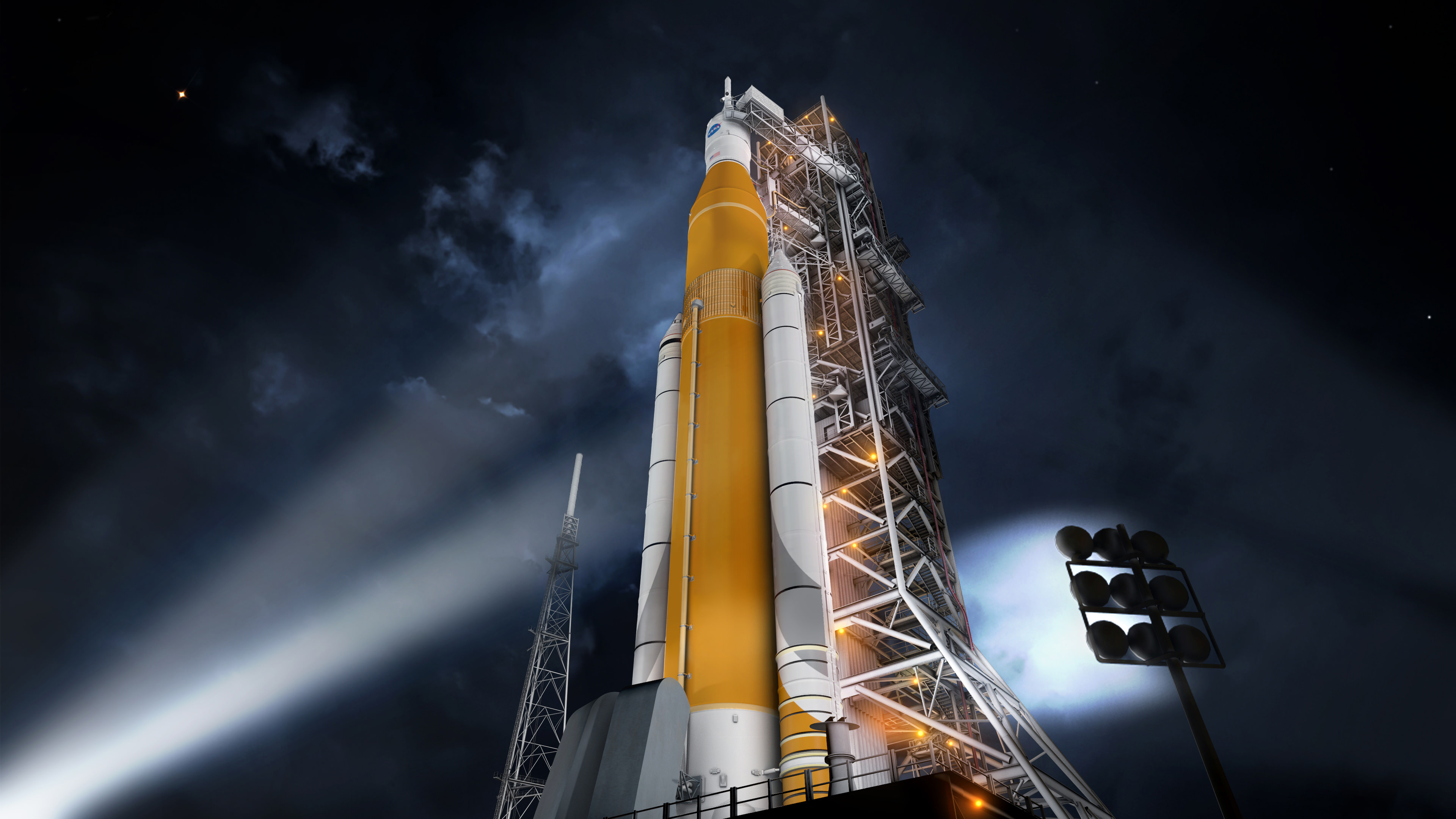 Artist concept of the SLS Block 1 configuration on the Mobile Launcher at KSC. Credit: NASA/MSFC