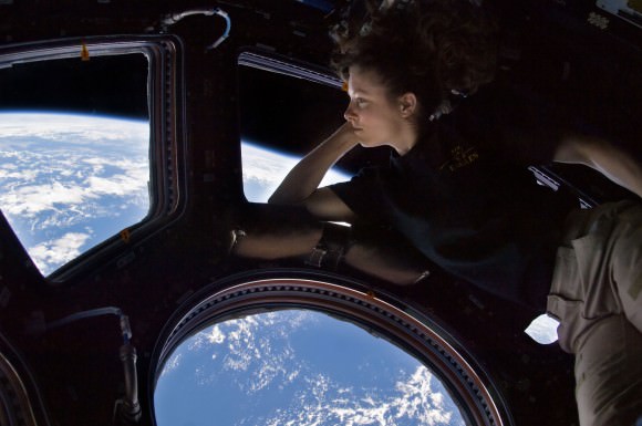 NASA astronaut Tracy Caldwell Dyson, an Expedition 24 flight engineer in 2010, took a moment during her space station mission to enjoy an unmatched view of home through a window in the Cupola of the International Space Station, the brilliant blue and white part of Earth glowing against the blackness of space. Credits: NASA
