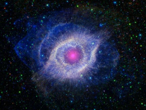Image of the Helix Nebula, combining from information from NASA's Spitzer Space Telescope and the Galaxy Evolution Explorer (GALEX). Credit: NASA