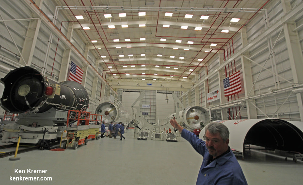 Mike Pinkston, Vice President and General Manager Orbital ATK’s Antares program describes  all the major components of Antares rocket hardware being integrated inside the Horizontal Integration Facility at NASA’s Wallops Flight Facility in Virginia for upcoming ‘Return to Flight’ missions in 2016.  Credit: Ken Kremer/kenkremer.com