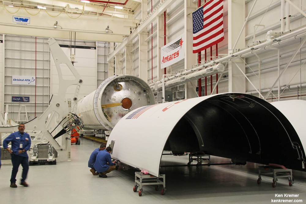 Technicians at work processing and integrating Antares rocket core stage, payload fairing and other components inside the Horizontal Integration Facility at NASA’s Wallops Flight Facility  for flights in 2016. Credit: Ken Kremer/kenkremer.com