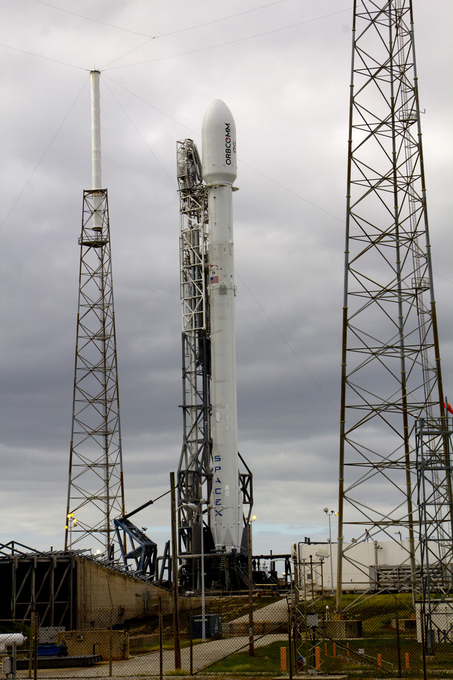 SpaceX Falcon 9 rocket for Orbcomm OG2 launch stands vertical at pad 40 at Cape Canaveral, Fla. for launch on Dec. 20, 2015.  Credit: Jeff Seibert/AmericaSpace