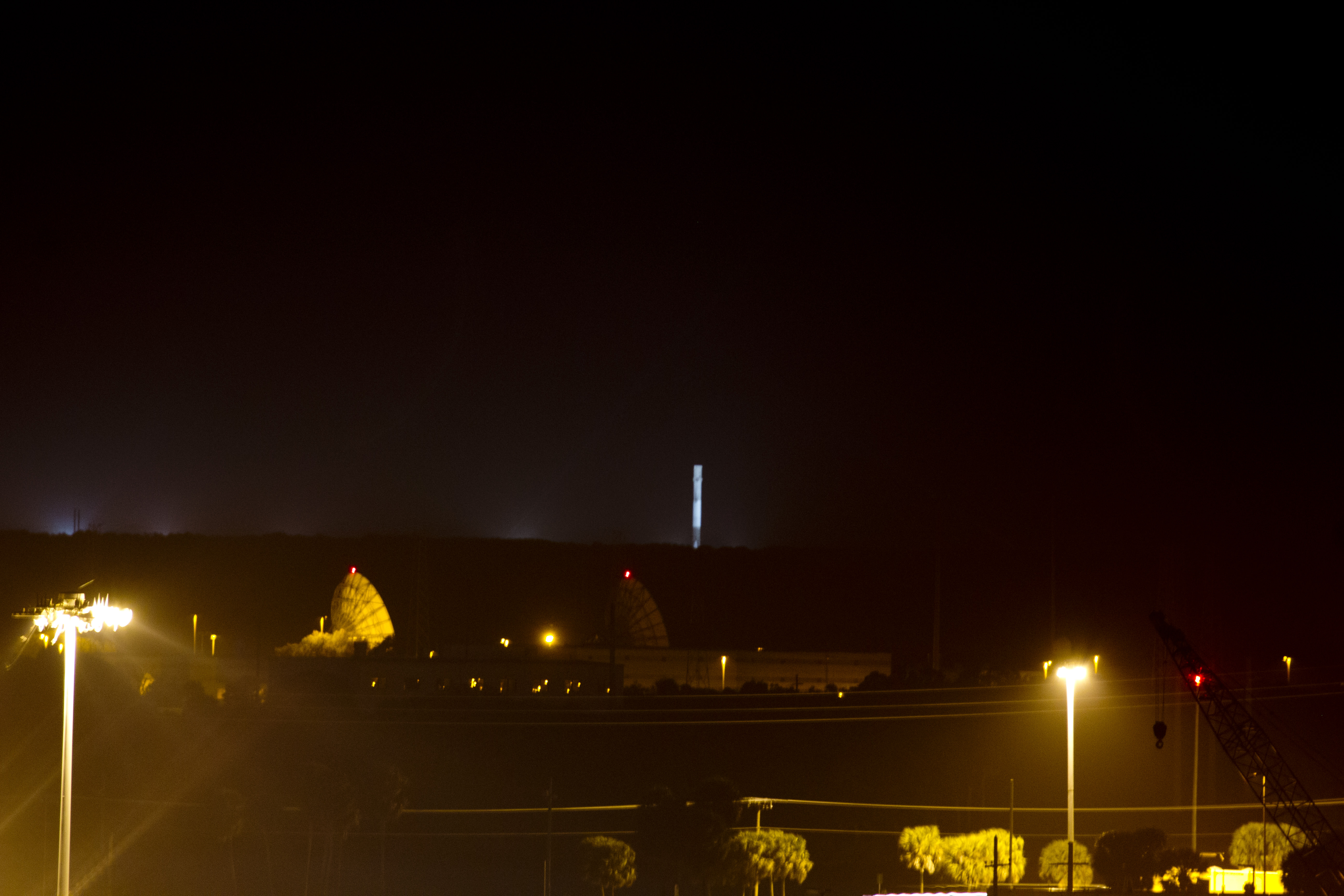Touchdown view of SpaceX Falcon 9 rocket at Landing Zone 1 at Cape Canaveral, Fla. on Dec. 21, 2015 as seen from atop Exploration Tower.  Credit: Jeff Seibert/AmericaSpace 