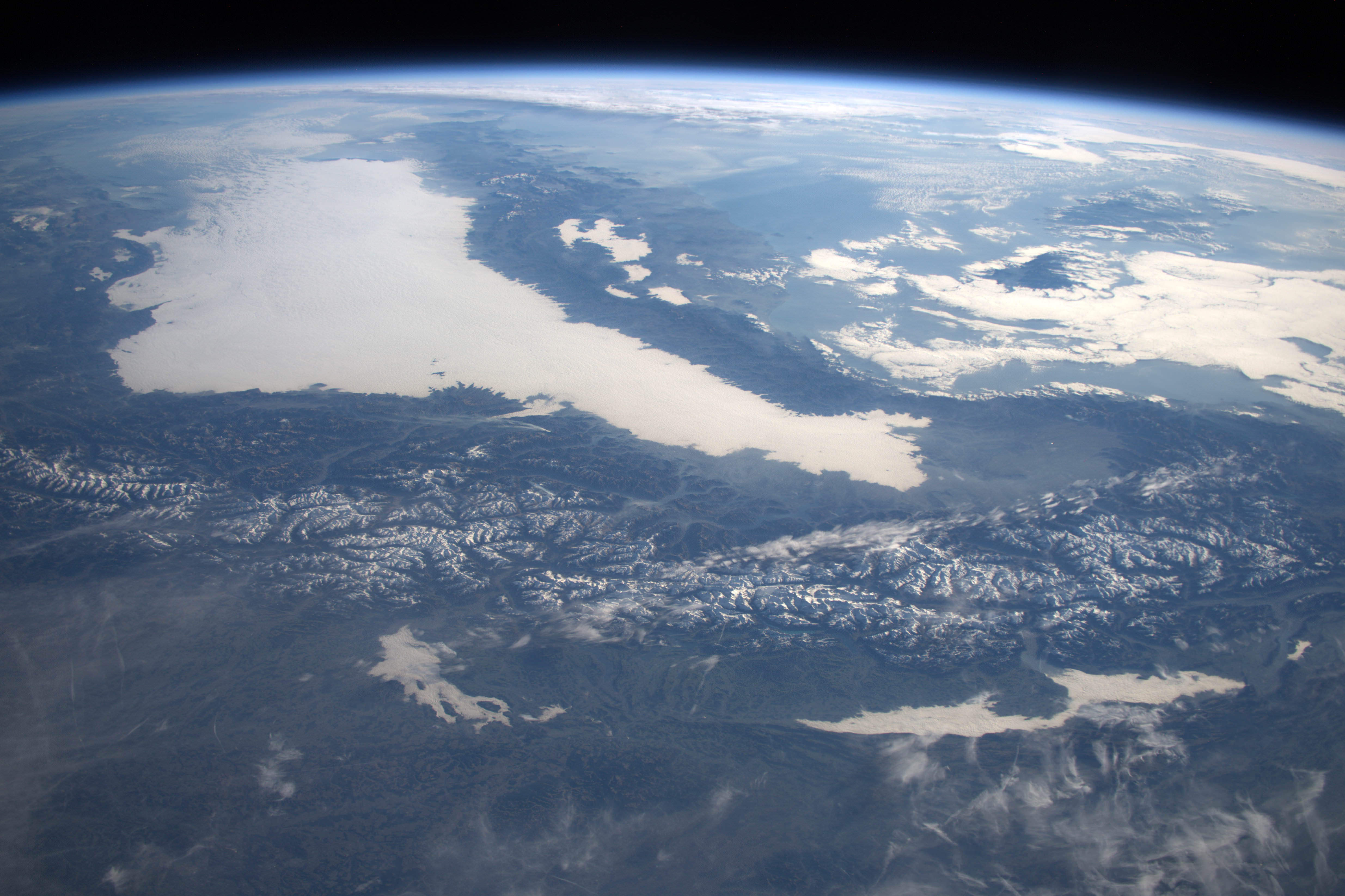 The Alps in Winter."There may not be much snow in the Alps this winter but they still look stunning from here! #Principia.” Credit: ESA/NASA/Tim Peake/@astro_timpeake