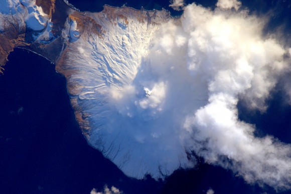 Aleutian island #volcano letting off a little steam after the new year on Jan 2, 2016. #YearInSpace. Credit: NASA/Scott Kelly/@StationCDRKelly