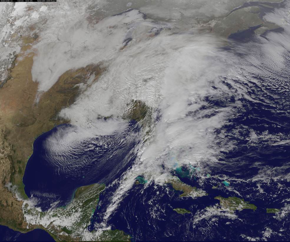 This visible image from NOAA's GOES-East satellite at 1830 UTC (1:30 p.m. EST) on Jan. 22, 2016 shows the major winter storm now affecting the U.S. East coast.  Credits: NASA/NOAA GOES Project
