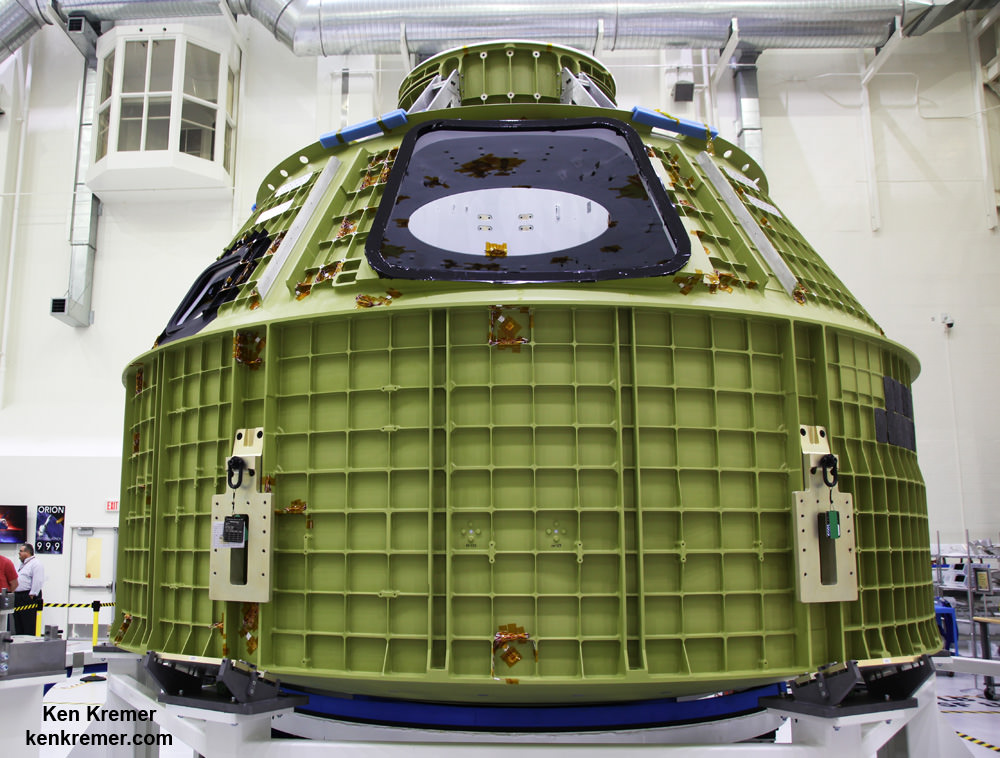 Orion crew module pressure vessel for NASA’s Exploration Mission-1 (EM-1) is unveiled for the first time on Feb. 3, 2016 after arrival at the agency’s Kennedy Space Center (KSC) in Florida. It is secured for processing in a test stand called the birdcage in the high bay inside the Neil Armstrong Operations and Checkout (O&C) Building at KSC. Launch to the Moon is slated in 2018 atop the SLS rocket.  Credit: Ken Kremer/kenkremer.com