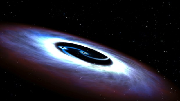 An illustration of Markarian 231, a binary black hole 1.3 billion light years from Earth. Their collision generated the first gravitational waves we've ever detected. Image: NASA