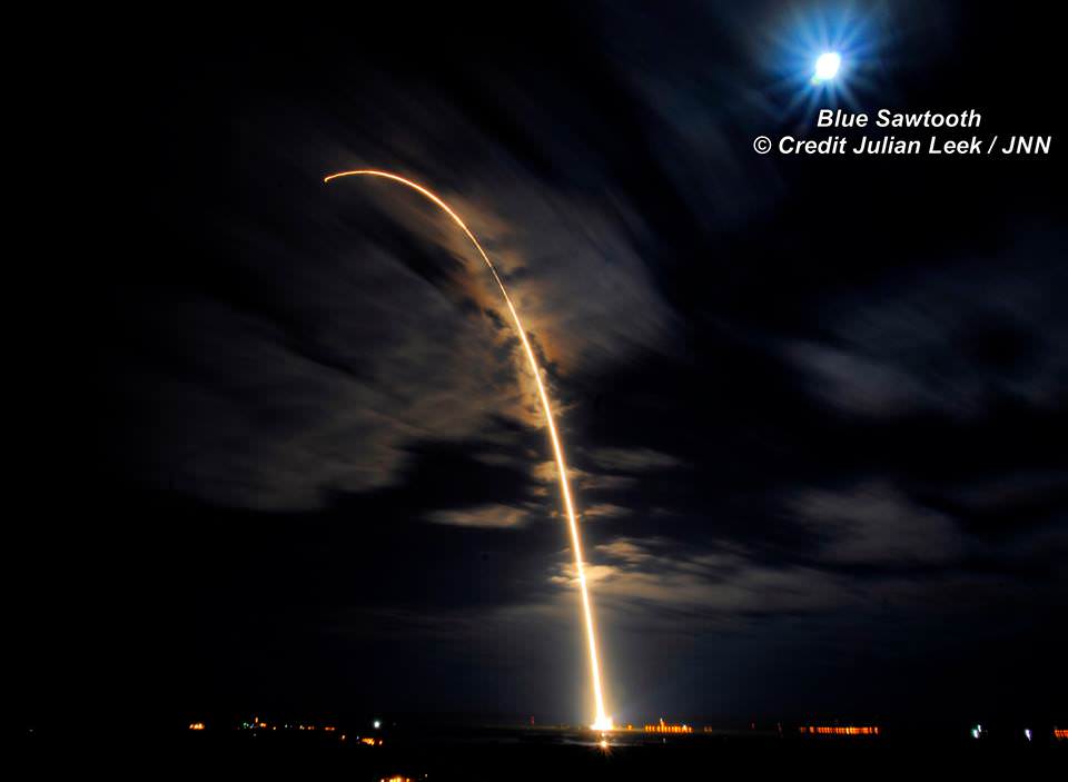 ULA Atlas V rockets to orbits with Orbital ATK Cygnus OA-6 in this long exposure streak shot taken from the roof of the world famous Vehicle Assembly Building (VAB) at NASA’s Kennedy Space Center in Florida.  Liftoff from nearby Space Launch Complex 41 on Cape Canaveral Air Force Station in Florida occurred at 11:05 p.m. EDT on March 22, 2016 . Credit: Julian Leek