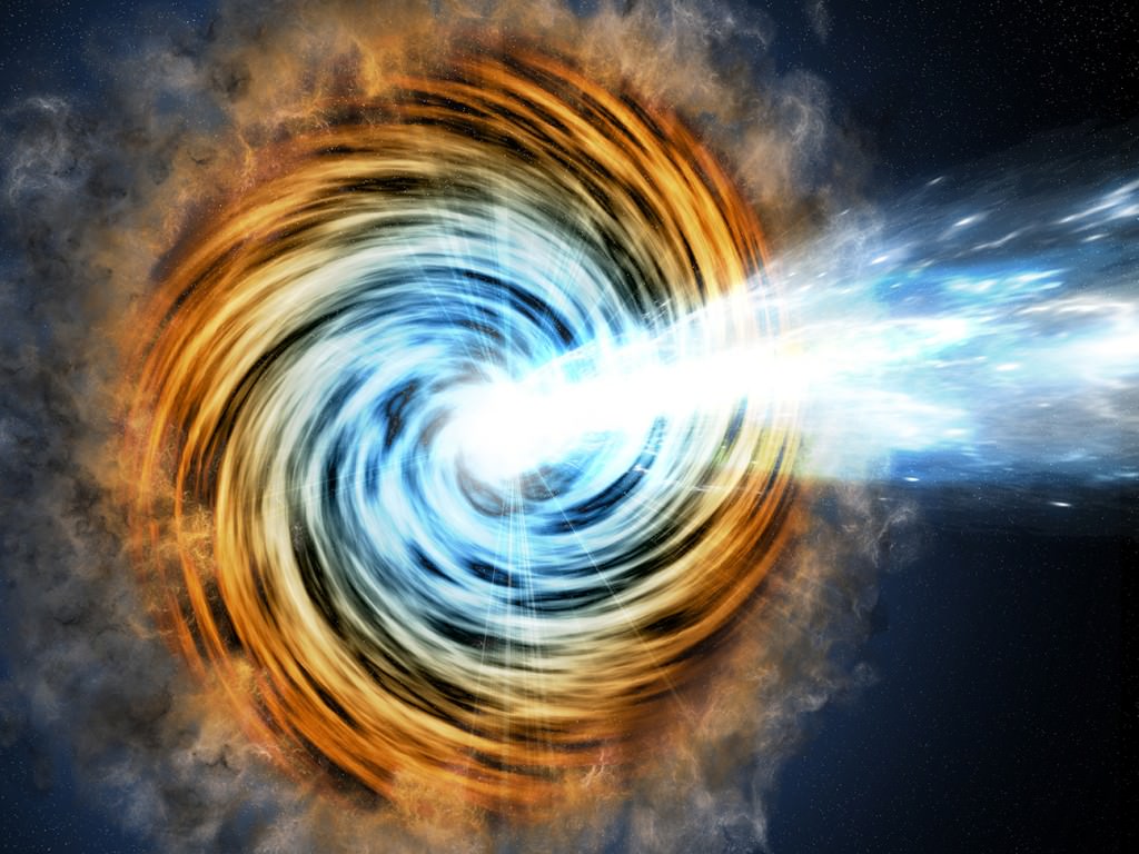 Black-hole-powered galaxies called blazars are the most common sources detected by NASA's Fermi Gamma-ray Space Telescope. As matter falls toward the supermassive black hole at the galaxy's center, some of it is accelerated outward at nearly the speed of light along jets pointed in opposite directions. When one of the jets happens to be aimed in the direction of Earth, as illustrated here, the galaxy appears especially bright and is classified as a blazar. Credits: M. Weiss/CfA