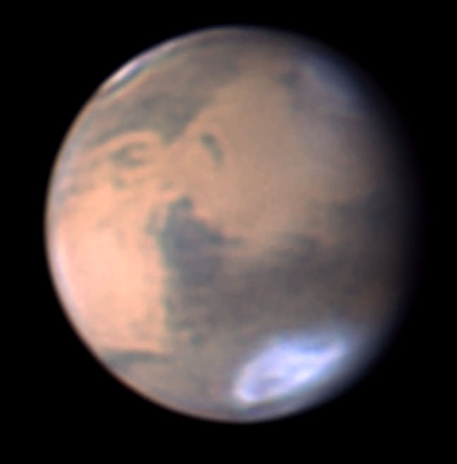 Clouds gather over Mars' Hellas Basin in this photo taken March 23. The Red Planet has intrigued humankind for centuries. Credit: Anthony Wesley