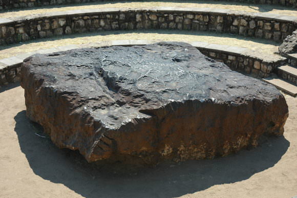 This is the Hoba meteorite from Namibia. It is the largest known intact meteorite, at 60 tonnes. Image: Patrick Giraud, http://creativecommons.org/licenses/by/2.5