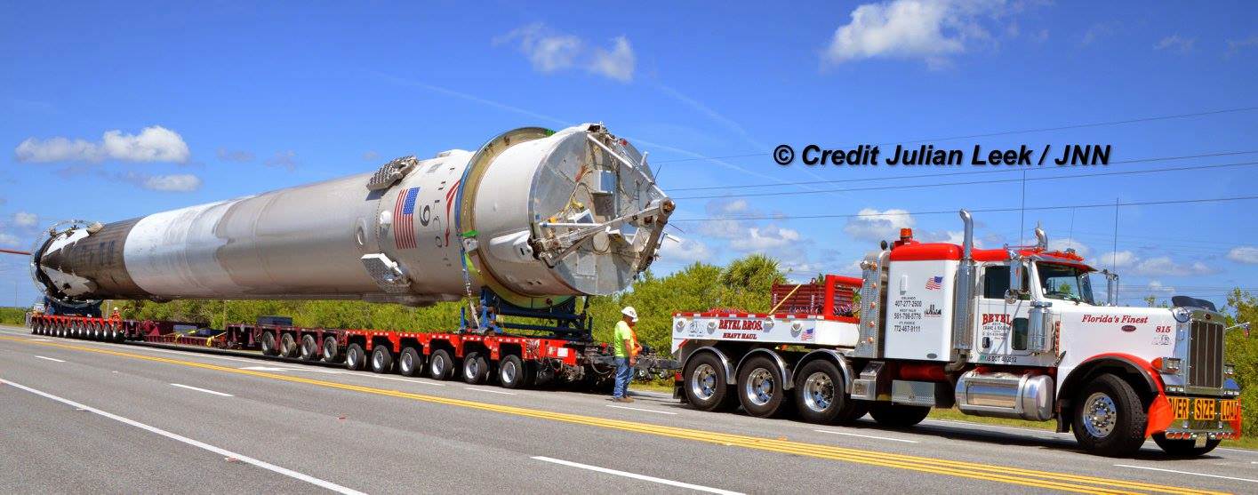 Recovered SpaceX Falcon 9 first stage rocket was transported horizontally back to SpaceX processing hanger at the Kennedy Space Center from Port Canaveral, Florida storage and processing facility on April 19, 2016. Credit: Julian Leek