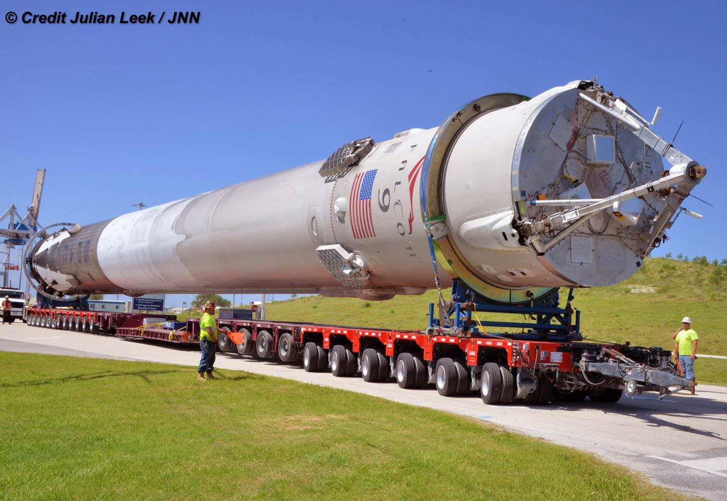 Recovered SpaceX Falcon 9 first stage rocket was transported horizontally back to SpaceX processing hanger at the Kennedy Space Center from Port Canaveral, Florida storage and processing facility on April 19, 2016. Credit: Julian Leek
