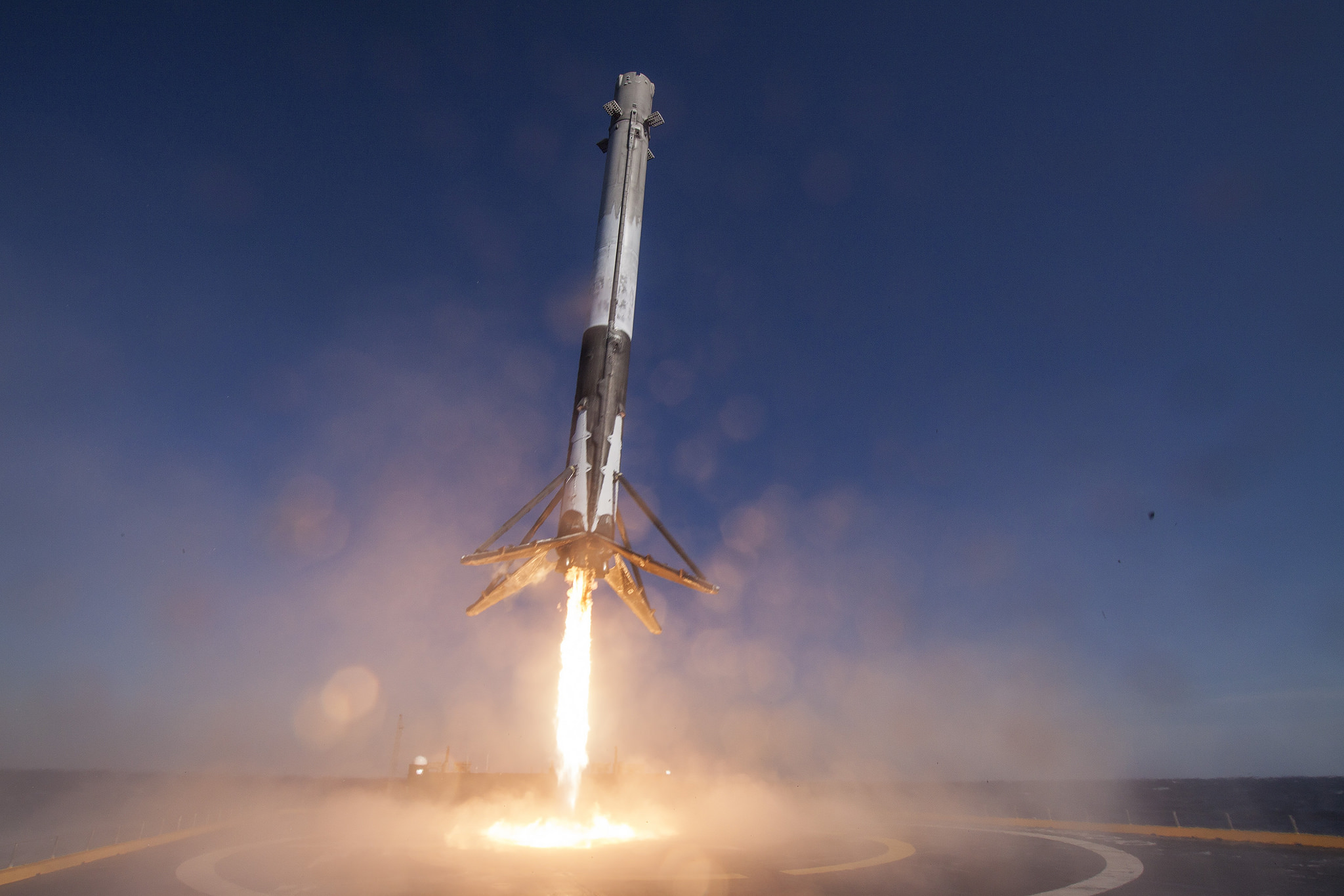 Remote camera photo from "Of Course I Still Love You" droneship of Falcon 9 first stage landing following launch of Dragon cargo ship to ISS on CRS-8 mission on 8 April 2016. Credit: SpaceX