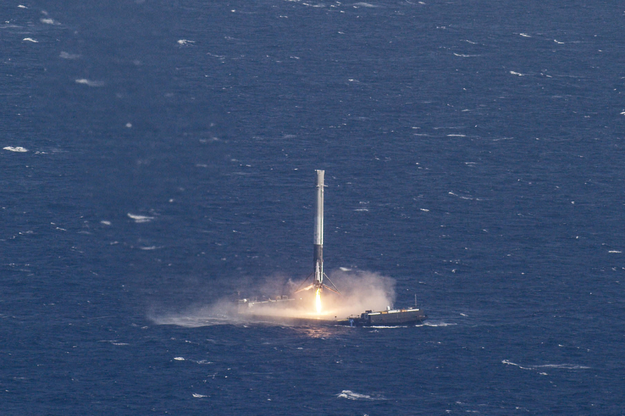 SpaceX Falcon 9 booster successfully lands on droneship after blastoff on Dragon CRS-8 mission to ISS for NASA on April 8, 2016.  Credit: SpaceX