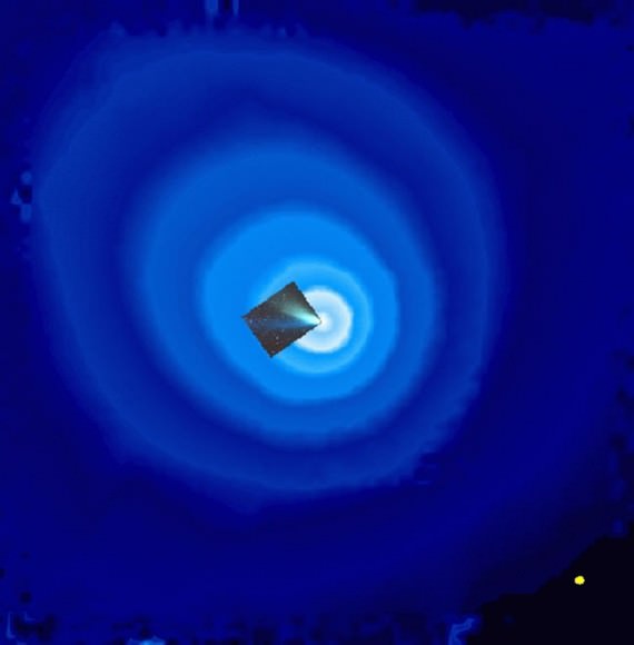 A huge cloud of hydrogen surrounded Comet Hale-Bopp when it neared the Sun in the spring of 1997. Ultraviolet light, charted by the SWAN instrument on the SOHO spacecraft, revealed a cloud 100 million kilometres wide and diminishing in intensity outwards (contour lines). It far exceeded the great comet's visible tail (inset photograph). Although generated by a comet nucleus perhaps 40 kilometres in diameter, the hydrogen cloud was 70 times wider than the Sun itself (yellow circle to scale)
