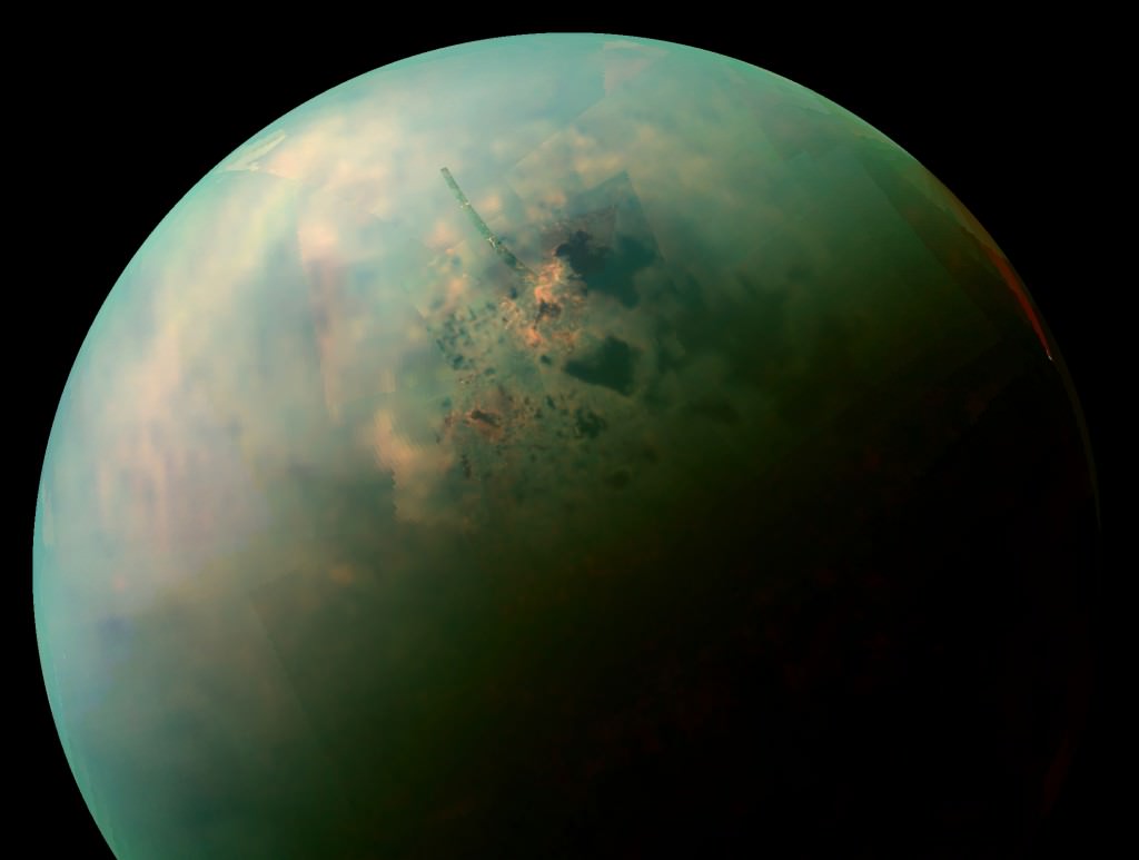 Titan's dense, hydrocarbon rich atmosphere remains a focal point of scientific research. Credit: NASA