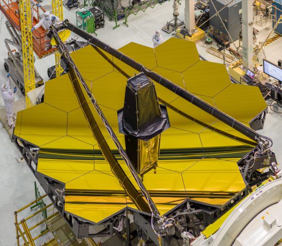 The primary mirror of the James Webb Space Telescope is unfolded once it's in space. If it fails to deploy properly, NASA may need to use the Dream Chaser to keep the Hubble Telescope operating instead. Image: NASA/Chris Gunn