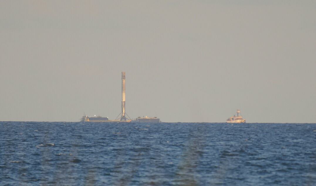 SpaceX ASDS drone ship with the recovered Falcon 9 first stage rocket lurking off Port Canaveral waiting to enter the port.  Copyright:  Julian Leek