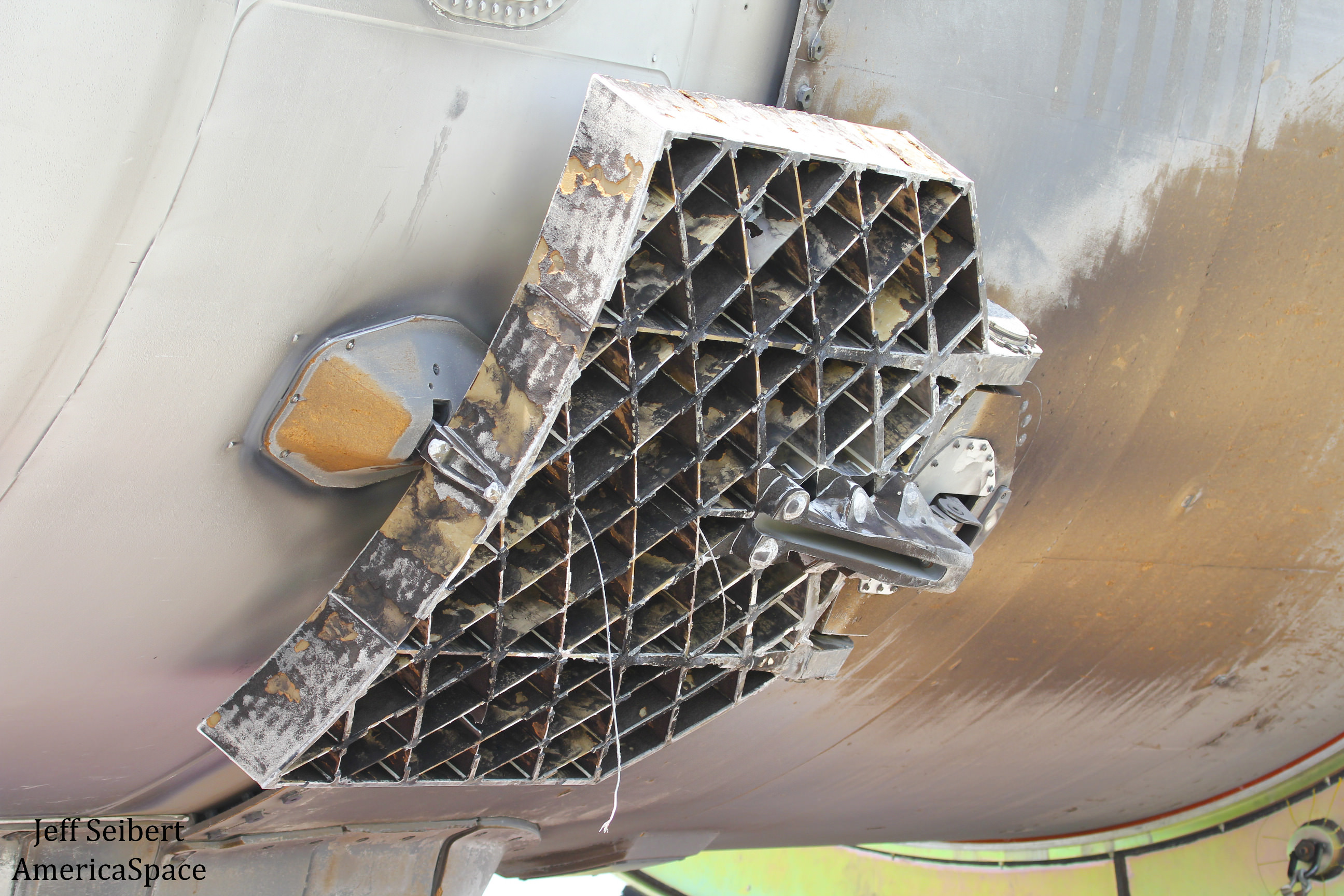 Up close look at grid fins from recovered first stage booster after SpaceX JCSAT-14 launch during transport to SpaceX hangar at pad 39A at the Kennedy Space Center, Florida. Credit: Jeff Seibert/AmericaSpace