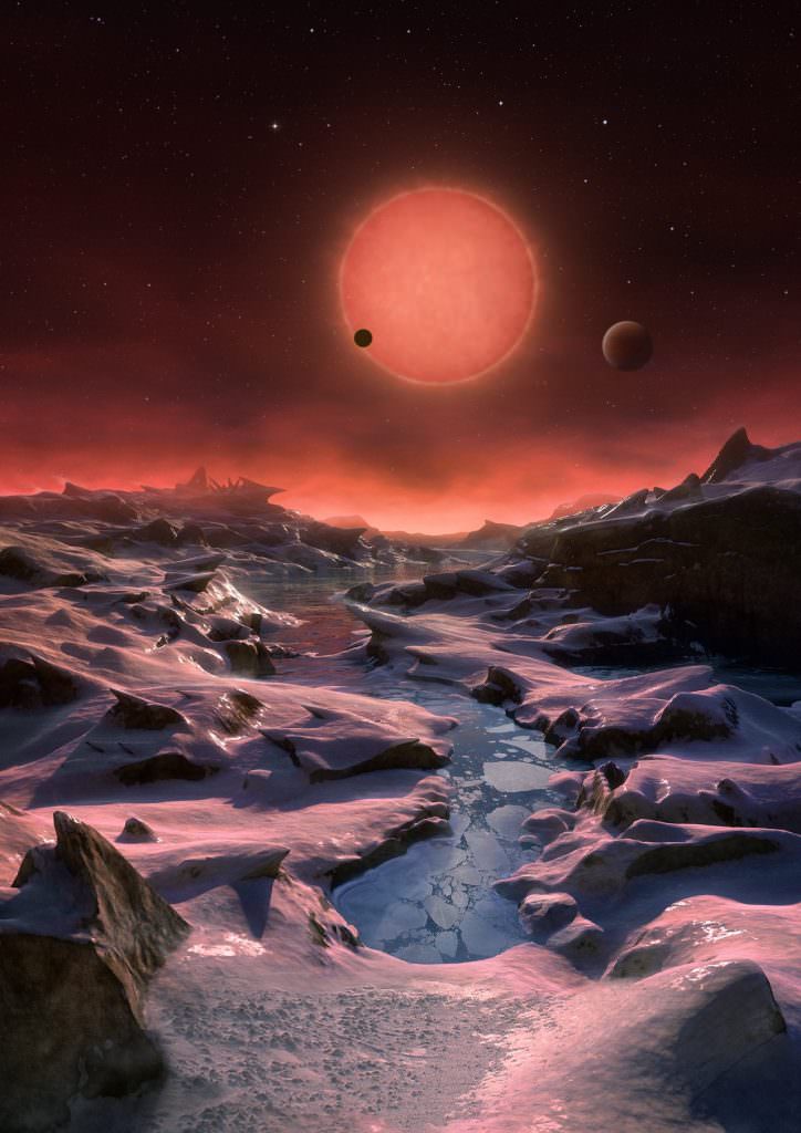Artist's impression of the view from the most distant exoplanet discovered around the red dwarf star TRAPPIST-1. Credit: ESO/M. Kornmesser.