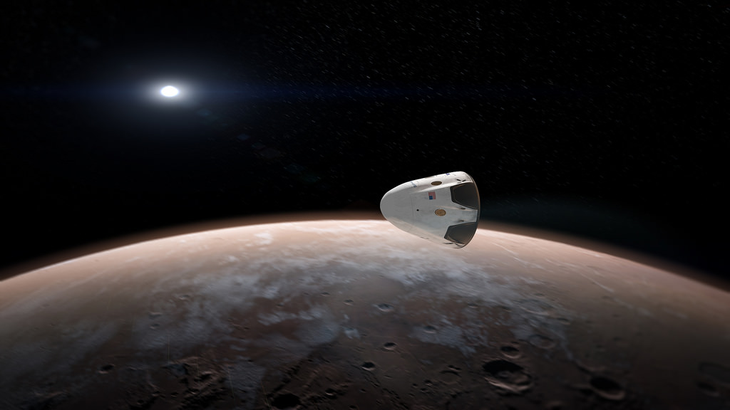 Elon Musk has announced ambitious plans to send humans to Mars by 2024. Image: Artist's drawing of the Dragon capsule at Mars. SpaceX.
