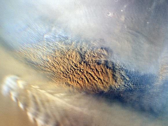 This Martian sandstorm was captured by the MRO's Mars Color Imager instrument. Scientists were monitoring such storms prior to Curiosity's arrival on Mars. Image: NASA/JPL-Caltech/MSSS
