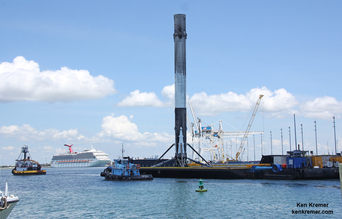 SpaceX Falcon 9 booster moving along the Port Canaveral channel atop droneship platform with cruise ship in background nears ground docking facility on June 2, 2016 following Thaicom-8 launch on May 27, 2016.  Credit: Ken Kremer/kenkremer.com