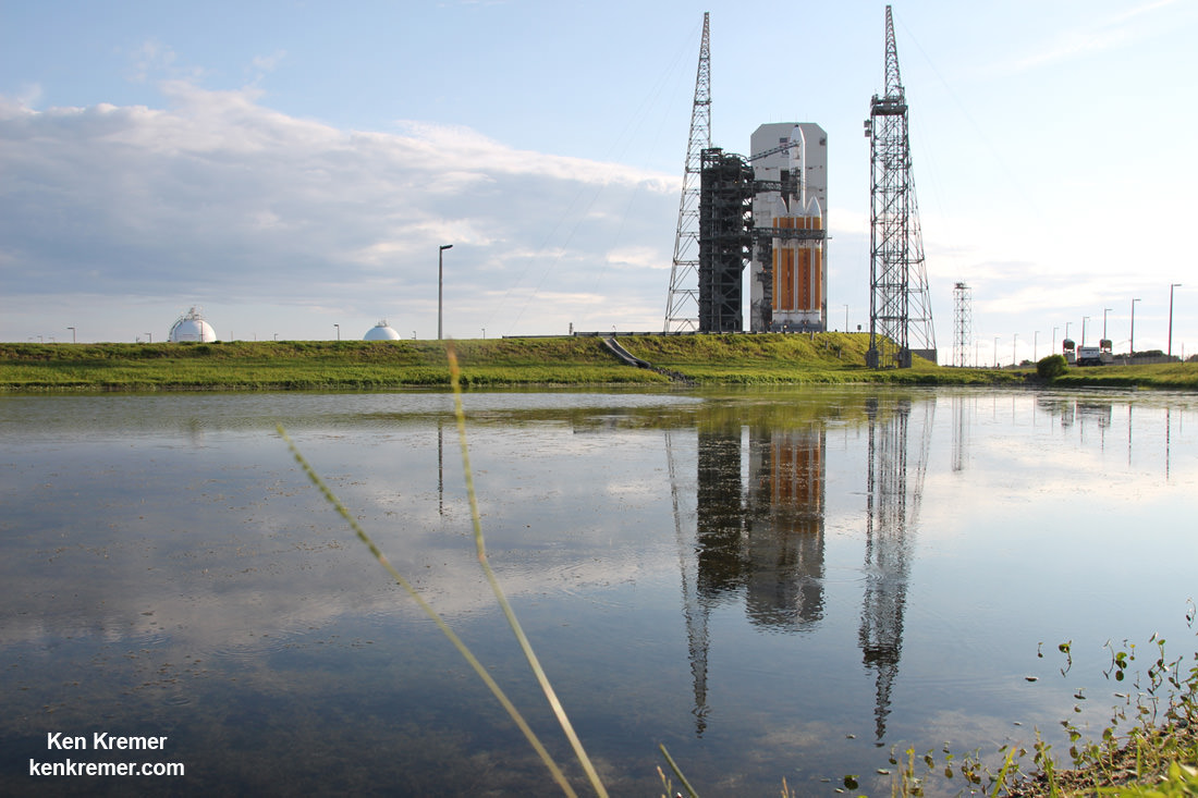 The Delta 4 Heavy carrying NROL-37 clandestine intelligence satellite reflecting in the pond around Space Launch Complex-37 at Cape Canaveral Air Force Station prior to planned launch on June 11, 2016.  Credit: Ken Kremer/kenkremer.com 