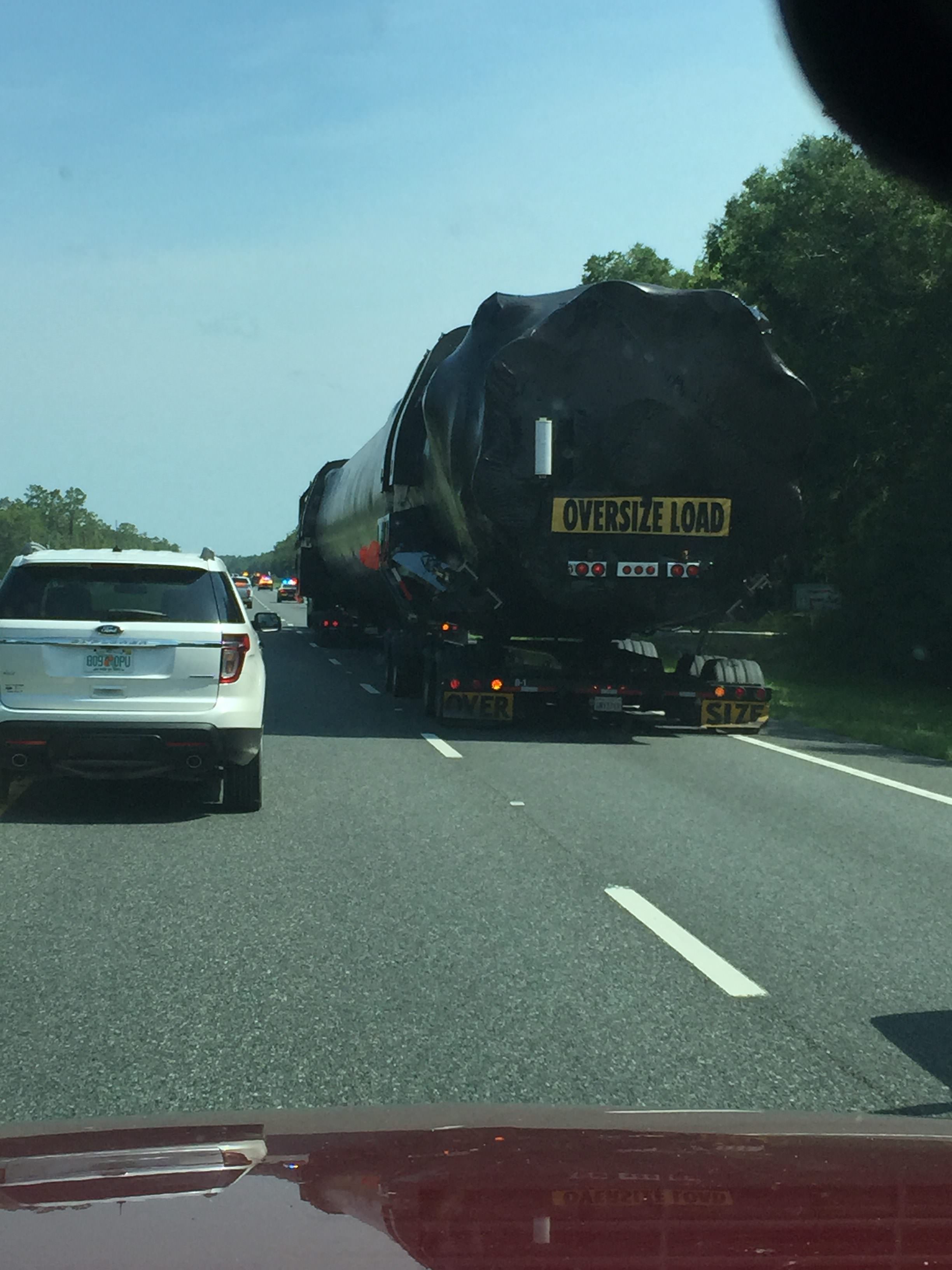 An apparent SpaceX Falcon 9 recovered booster is spotted on US 19 North of Crystal River, Fl on June 13, 2016. Credit: Marie Bieniek