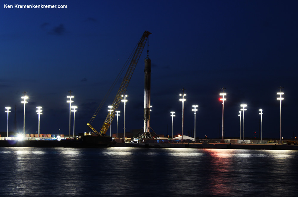 Recovered SpaceX Falcon 9 basks in nighttime glow after arriving into Port Canaveral on June 2, 2016.  Credit: Ken Kremer/kenkremer.com