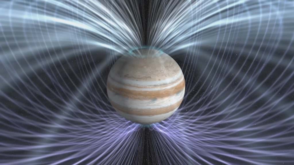 Jupiter has an extremely powerful magnetic field. Ganymede has one, too, and is the only moon with one. Jupiter's envelops Ganymede's and their interactions are just part of the pair's complicated relationship. Image Credit: NASA Goddard Space Flight Center.