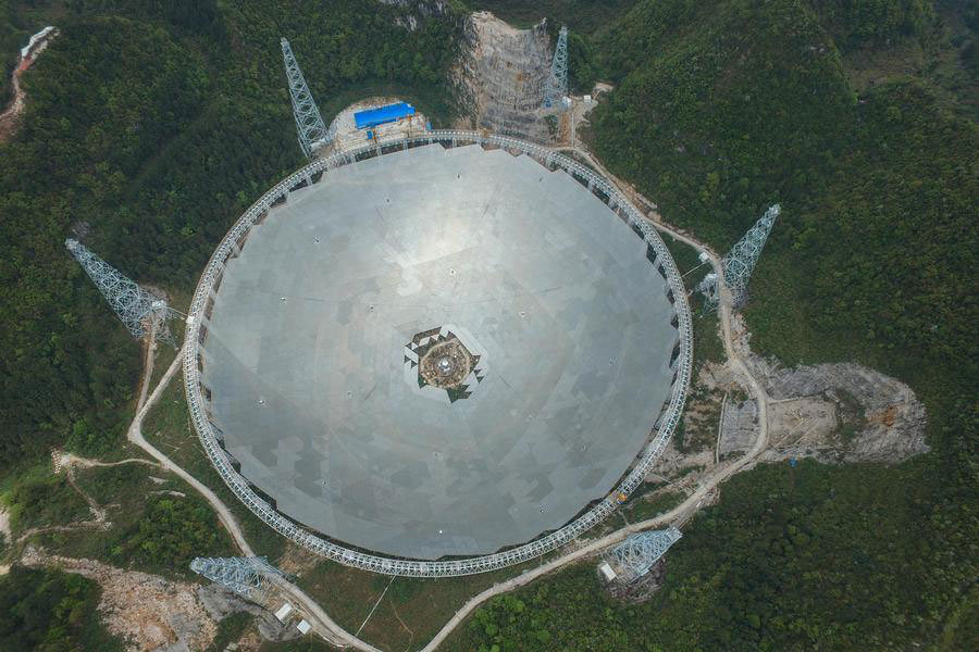 e FAST radio telescope under construction in the Dawodang depression in Guizhou, China. Image Credit: NAOC