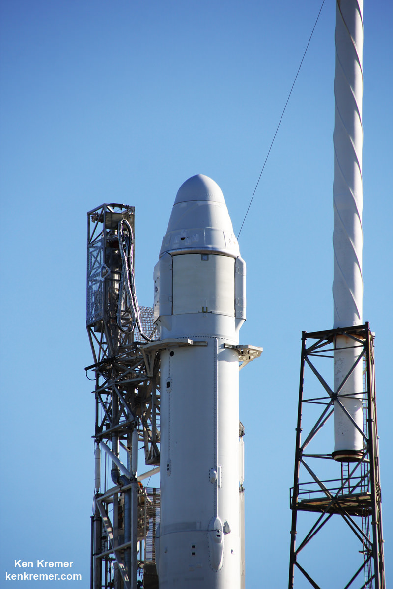 Up close view of SpaceX Dragon CRS-9 resupply ship and solar panels atop Falcon 9 rocket at pad 40 prior to blastoff to the ISS on July 18, 2016 from Cape Canaveral Air Force Station, Florida.   Credit: Ken Kremer/kenkremer.com