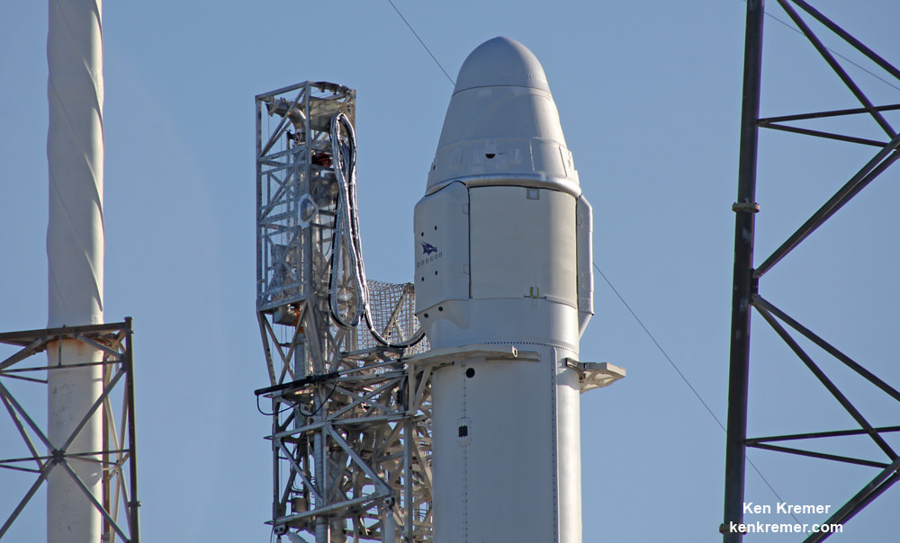 Up close view of SpaceX Dragon CRS-9 resupply ship and solar panels atop Falcon 9 rocket at pad 40 prior to blastoff to ISS on July 18, 2016 from Cape Canaveral Air Force Station, Florida.   Credit: Ken Kremer/kenkremer.com 