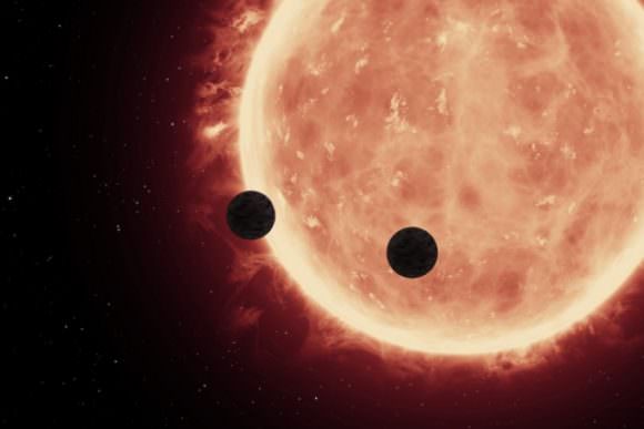 An artist’s depiction of planets transiting a red dwarf star in the TRAPPIST-1 System. Credit: NASA/ESA/STScl