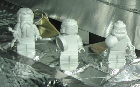 Three LEGO figurines representing the Roman god Jupiter, his wife Juno and Galileo Galilei are shown here aboard the Juno spacecraft. Credits: NASA/JPL-Caltech/KSC
