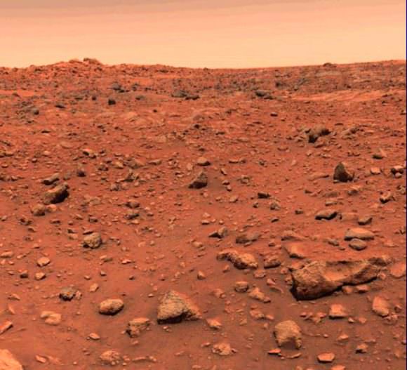 The first color photo taken of the Martian surface by the Viking 1 lander on July 21, 1976. The rock strewn landscape is a familiar one seen in photos taken by many landers since. Credit: NASA