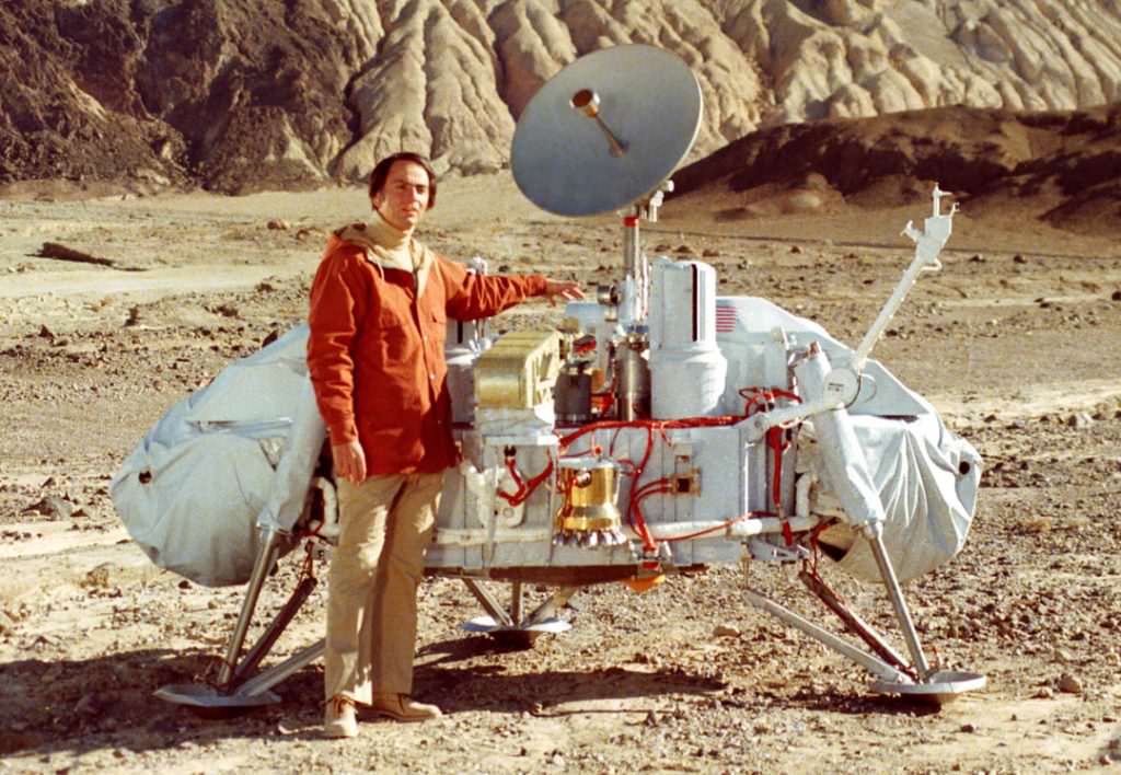 The late, great Carl Sagan stands next to a model of the Viking lander. Credit: NASA 