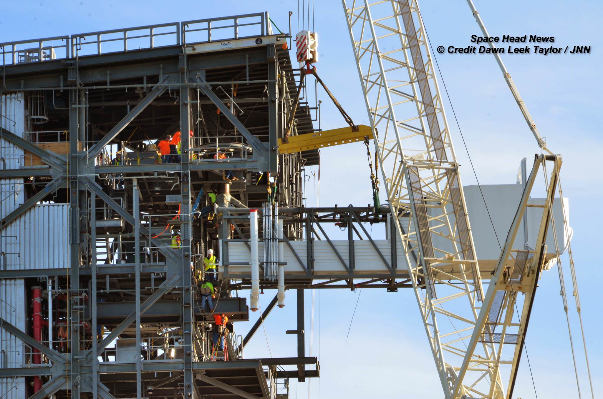 Up close view of Boeing Starliner Crew Access Arm and White Room craned into place at Crew Access Tower at Cape Canaveral Air Force Station’s Space Launch Complex 41 on Aug. 15, 2016.   Credit: Dawn Leek Taylor