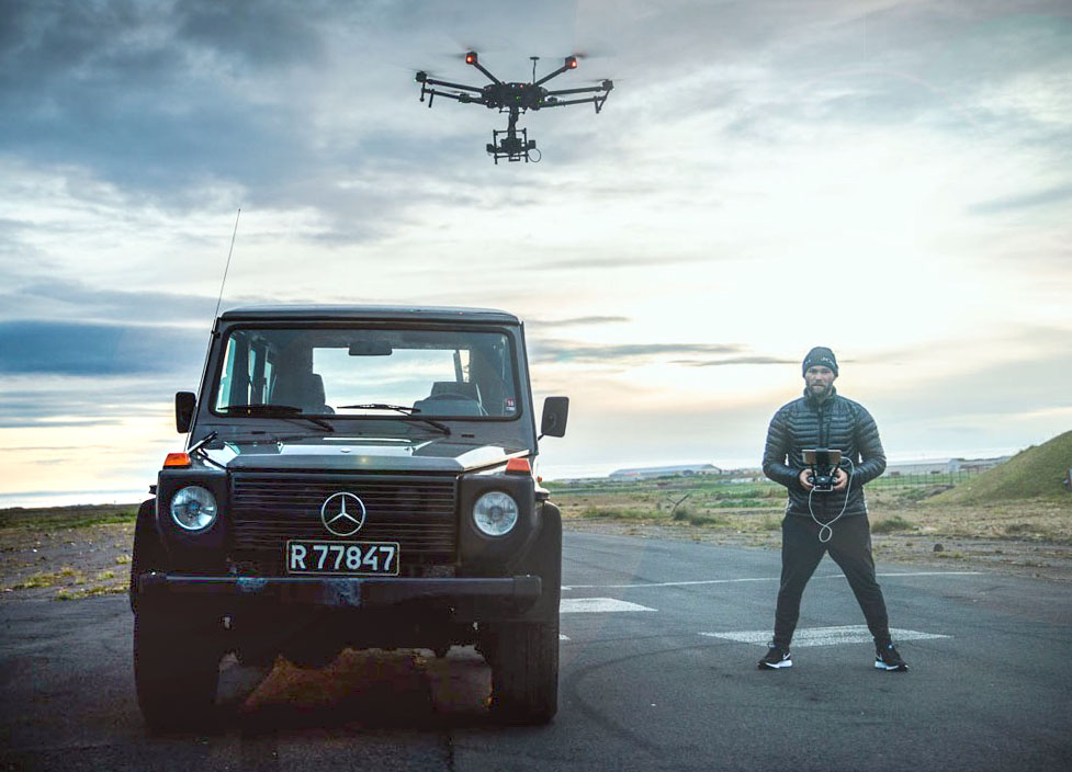 Oli Haukur operates the drone and camera during a test run. Credit: Oli Hauku / OZZO Photography