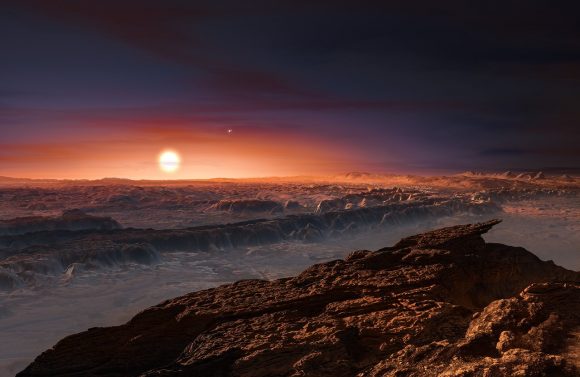 Artist’s impression of the surface of the planet Proxima b orbiting the red dwarf star Proxima Centauri. The double star Alpha Centauri AB is visible to the upper right of Proxima itself. Credit: ESO