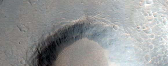 Crater Near Hydaspis Chaos. Credit: NASA/JPL/University of Arizona.