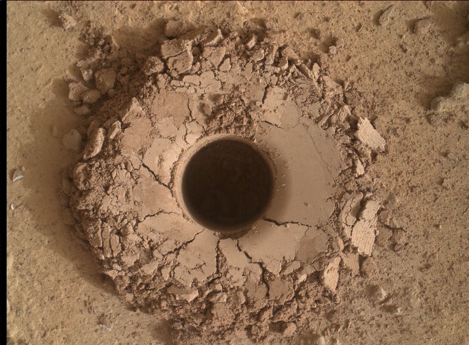 Quela drill hole bored by Curiosity rover on Sol 1464, Sept. 18, 2016 as seen in this Matscam color image taken the same Sol. Credit: NASSA/JPL/MSSS 