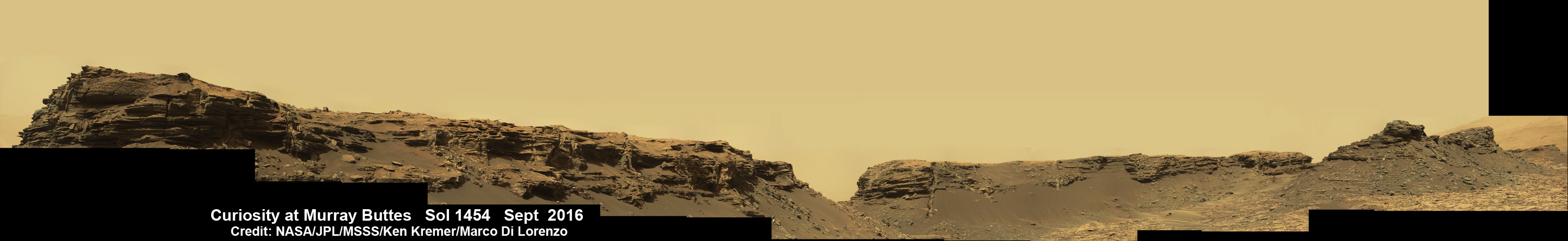 Spectacular wide angle mosaic view showing sloping buttes and layered outcrops within the Murray Buttes region on lower Mount Sharp from the Mast Camera (Mastcam) on NASA's Curiosity Mars rover. This photo mosaic is stitched from Mastcam camera raw images taken on Sol 1454, Sept. 9, 2016 with added artificial sky.  Credit: NASA/JPL/MSSS/Ken Kremer/kenkremer.com/Marco Di Lorenzo